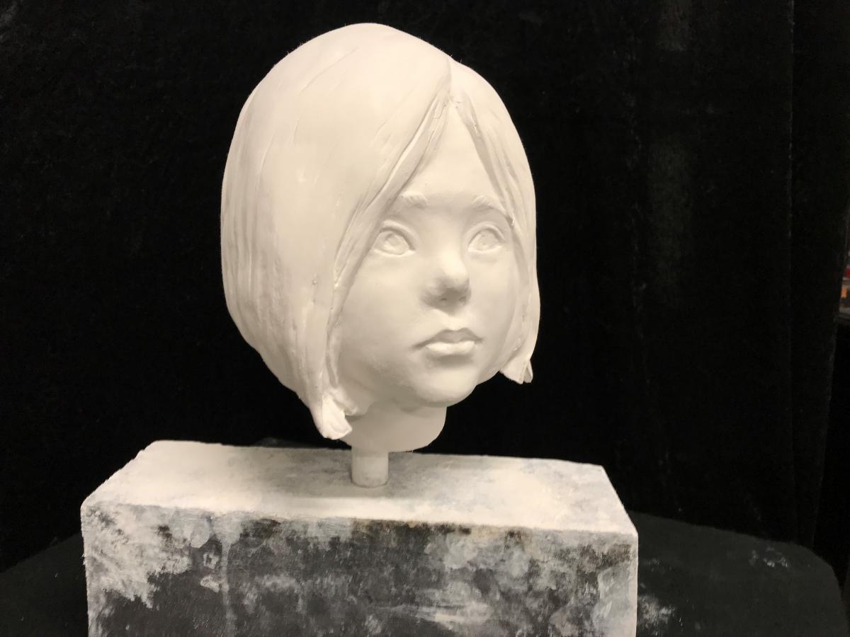 Virginia McKenzie clay sculpture girl